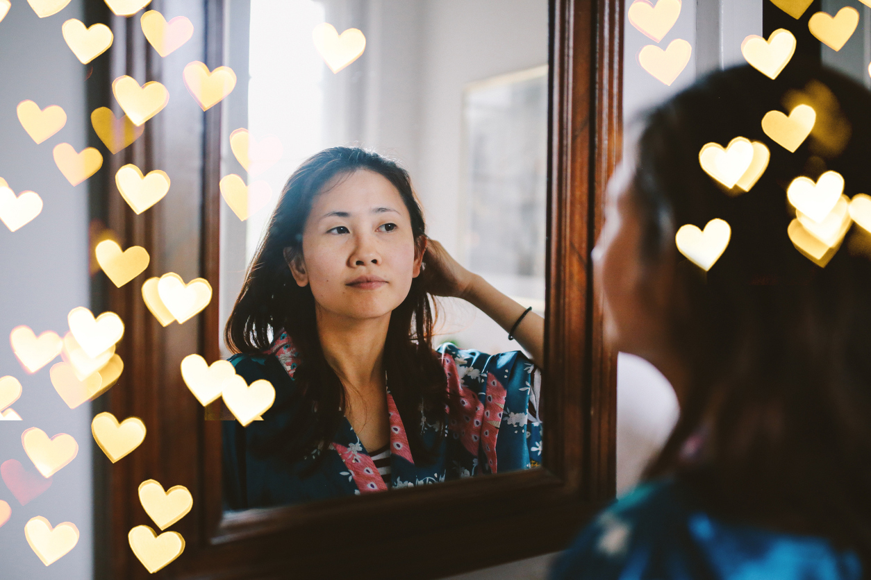 Self Love - Woman Looking into Mirror